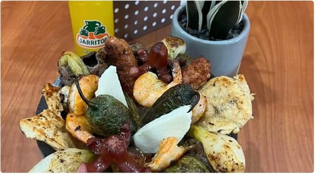 Steak, Chicken & Shrimp Molcajete.